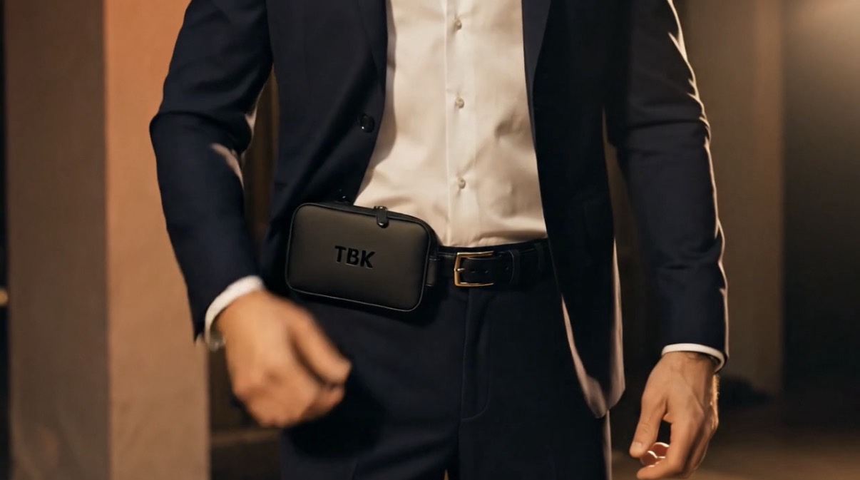 TBK The Belt Keeper worn by man in suit — flat on hip